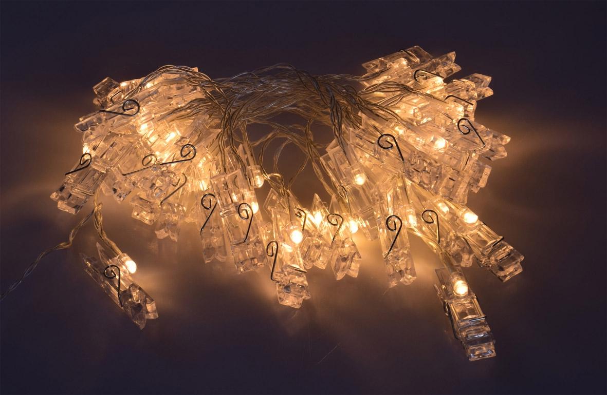 Guirlande à led avec 40 clips photo - blanc chaud - câble transparent - à piles (3xaa)